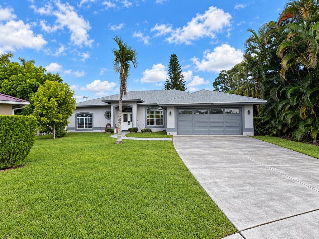 Photo of 117 Hemingway Court, Royal Palm Beach, FL 33411 (MLS # B26078728)
