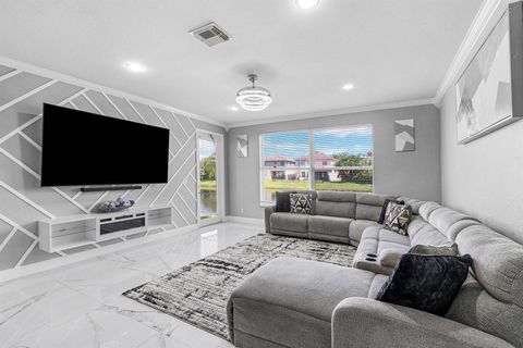 Photo of 2196 Oakmont Drive, Riviera Beach, FL 33404 (MLS # R11104504)