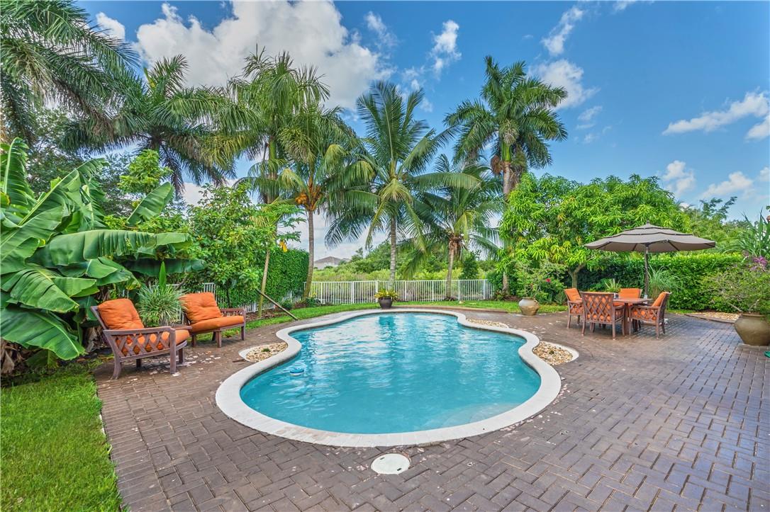 Located in the exclusive Reserve at Huntington, this elegant 3-bedroom + den, 3-bath pool home offers luxury and convenience just minutes from I-75. The open layout features a modern kitchen with high-end appliances and spacious living areas, perfect for entertaining. Enjoy your private fenced backyard with a sparkling pool—lawn and pool care included for hassle-free living. Nestled in a gated community near top-rated schools, shopping, and dining, this home is ideal for those seeking upscale comfort in a prime location.