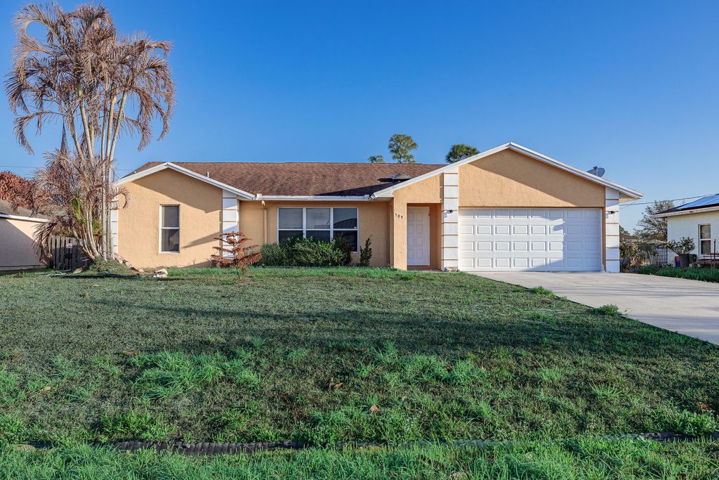 Photo of 509 SW Fairview Avenue, Port Saint Lucie, FL 34983 (MLS # B26000525)