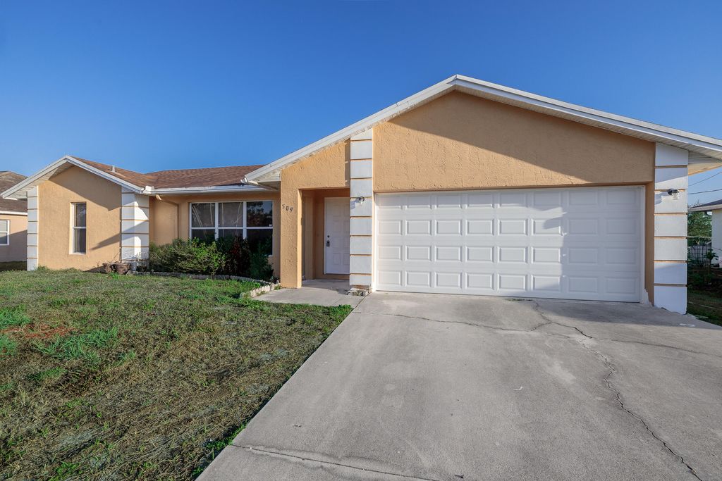 Photo of 509 SW Fairview Avenue, Port Saint Lucie, FL 34983 (MLS # B26000525)