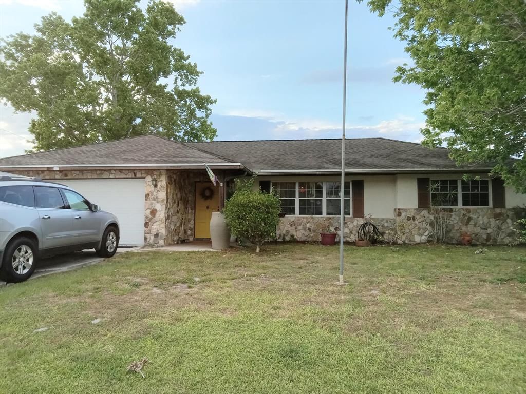 Photo of 597 SE Crosspoint Drive, Port St Lucie, FL 34983 (MLS # R10881656)