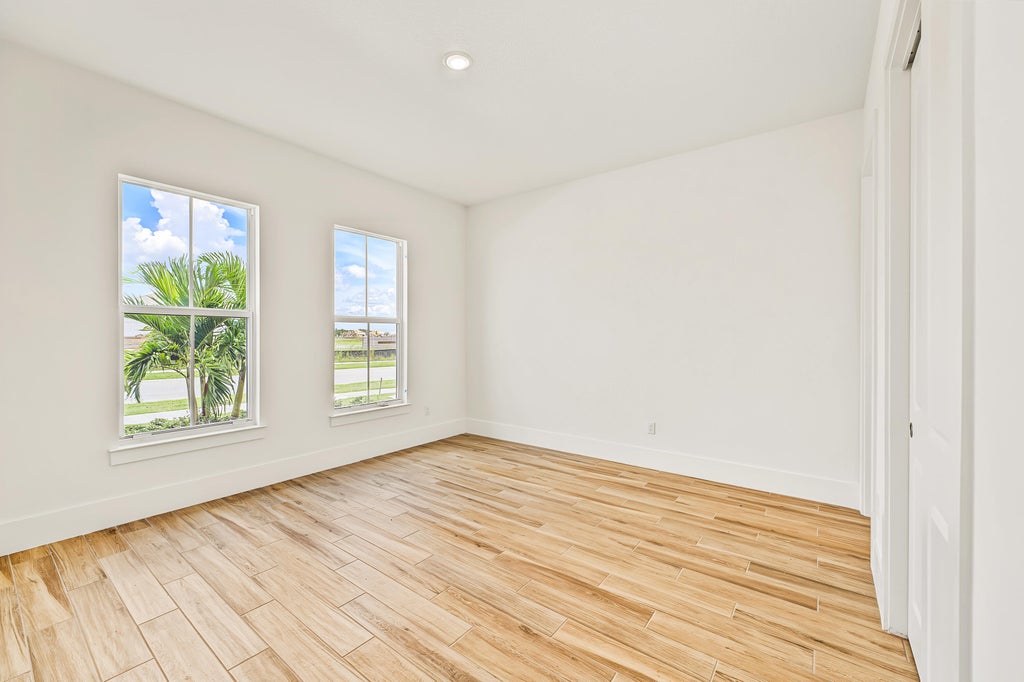 Photo of 10144 NW FIELD FLOWER Trail #153, Port Saint Lucie, FL 34987 (MLS # B26066930)