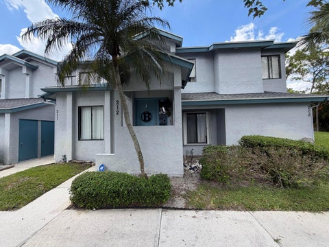 Photo of 212 Harbour Pointe Way, Greenacres, FL 33413 (MLS # B26040911)