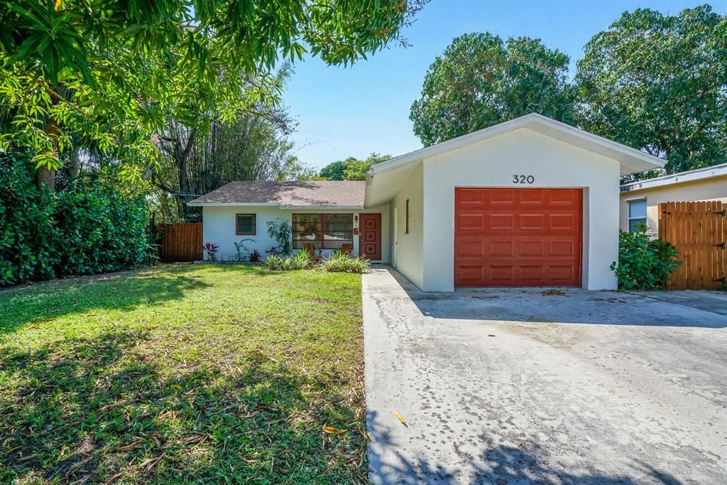 Photo of 320 33rd Street, West Palm Beach, FL 33407 (MLS # R10871629)