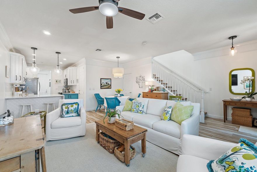 This beautifully upgraded DiVosta CBS-constructed townhome offers a rare blend of quality craftsmanship and turnkey comfort. Thoughtfully maintained by the same owner for 15 years and carefully reimagined in recent years, every detail has been considered. The kitchen was updated in 2023 and features a stunning quartz waterfall countertop with complementary tile backsplash. The primary bath renovation 2022 showcases floor-to-ceiling white subway tile, glass mosaic shower tile, a seamless shower door, and premium Kohler fixtures. The powder bath 2022 was refreshed with a new vanity, updated fixtures, and a charming designer wall covering. Throughout the home you'll find wood-look ceramic flooring 2022, a freshly painted interior, plantation shutters, upgraded lighting and ceiling fans,  tall-profile Kohler toilets, upgraded appliances, and new window screens, all contributing to a truly move-in ready experience. A long-lasting metal roof adds lasting peace of mind. Select furnishings are negotiable with the sale. Three outdoor spaces, a front porch and two upstairs balconies, invite you to slow down and enjoy the Florida lifestyle.      Mallory Creek is nestled within the prestigious Abacoa community, offering lush tropical surroundings and resort-style amenities: two community pools, a clubhouse with gym, scenic greenways, and well-lit tree-lined sidewalks. Pickleball, tennis, golf, and a skate park are all nearby. Abacoa Town Center delivers dining, shopping, live music, and Roger Dean Chevrolet Stadium, the spring training home of the St. Louis Cardinals and Miami Marlins.      Jupiter is one of Palm Beach County's most sought-after addresses, celebrated for its pristine beaches, championship golf, premier boating, and top-rated schools. Easy access to major thoroughfares puts you 30 minutes from Palm Beach International Airport, about an hour from Fort Lauderdale/Hollywood International, and 1.5 hours from Miami International. A rare opportunity to own a move-in ready home in one of Jupiter's most desirable communities.