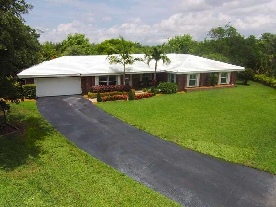 Completely and Perfectly Updated Home in the Stoneman Douglas HS District!! Situated on an expansive 1/2 acre, waterfront, cul-de-sac lot in one of Coral Springs Best Communities!!! Everything is new!! The Roof, A/C, Impact Windows, Bathrooms, Flooring, C rown Molding, Kitchen and Pool Area are ALL NEW!! Other features include Zen/Resort style pool area with stack Stone Fountain, Closet Cabinetry, Very Large Secondary Bedrooms & LED lighting!  Abundant Large/Wide windows create a light and bright home!