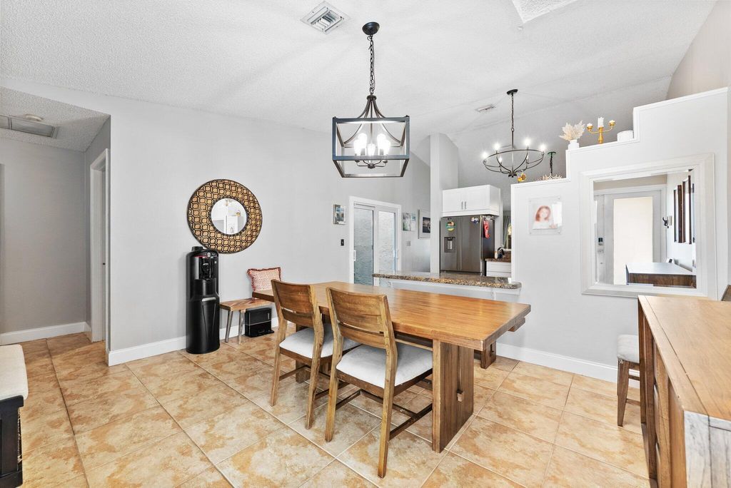 Photo of 5157 NW 11th Lane, Deerfield Beach, FL 33064 (MLS # R11164996)