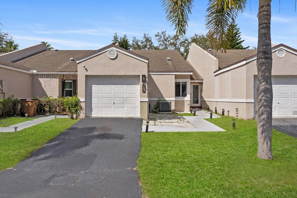 Photo of 5157 NW 11th Lane, Deerfield Beach, FL 33064 (MLS # R11164996)