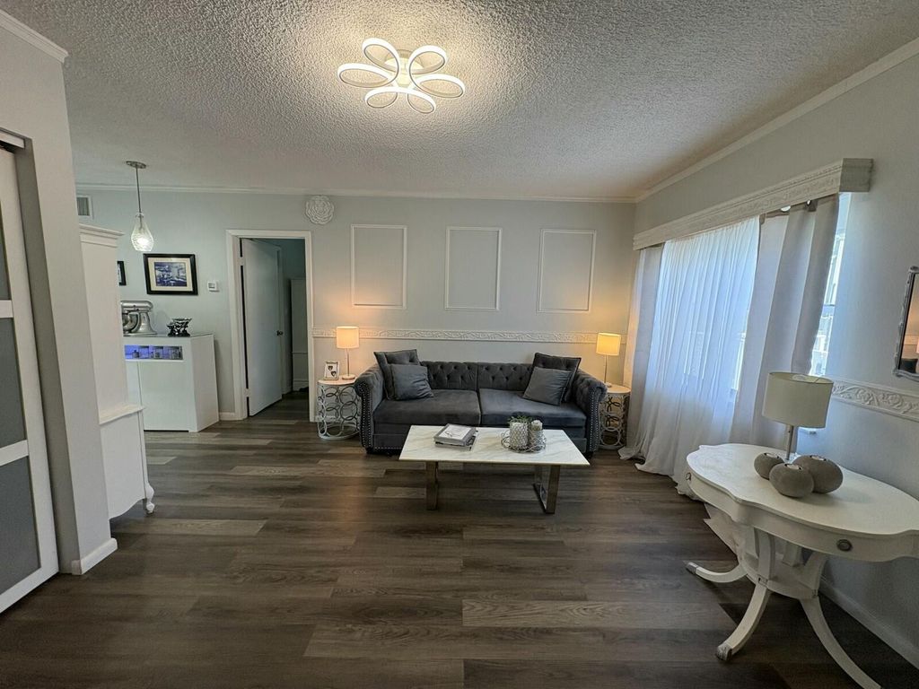 Photo of 609 NE 13th Avenue #101, Fort Lauderdale, FL 33304 (MLS # B26011841)