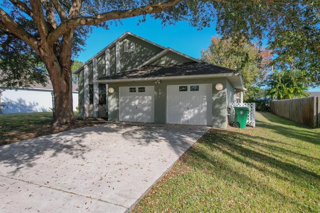 Photo of 991 SW Consolata Avenue, Port Saint Lucie, FL 34953 (MLS # R10765454)