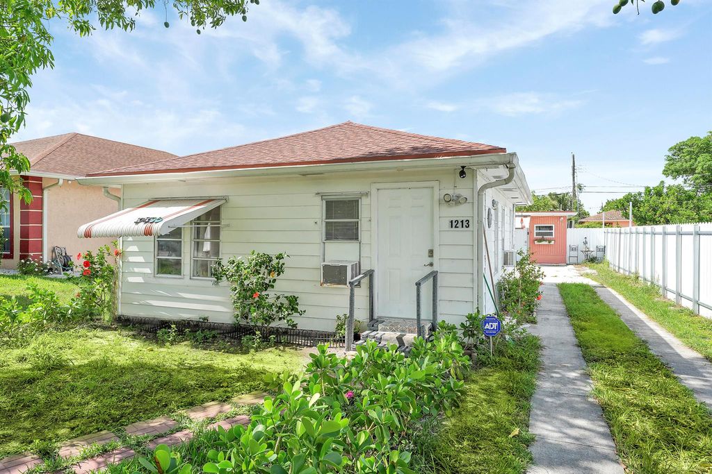 Photo of 1215 18th Avenue N, Lake Worth Beach, FL 33460 (MLS # R11146465)