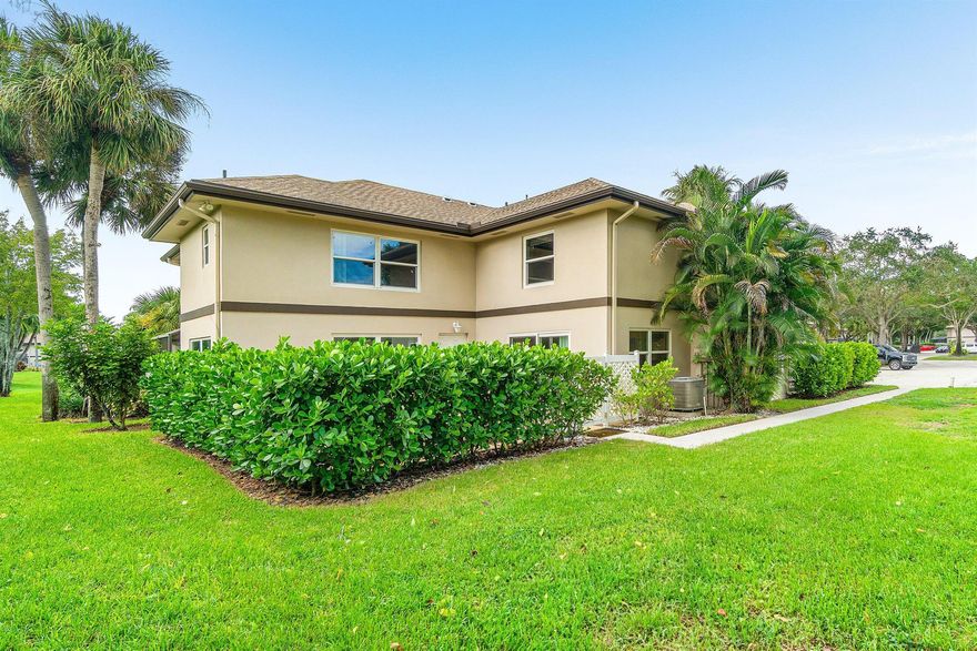 Picture yourself in this charming two-story townhouse  in fabulous Royal Palm Beach. Tastefully updated 2 bedroom/ 2 and 1 1/2 bath, Impact Windows, spacious closets in each bedroom. A Private fenced-in patio. Full size washer and dryer. Bright and light townhome. Community amenities include a lovely pool. Two assigned parking spaces, Beautifully manicured parklike grounds throughout the neighborhood. Ready to move in. Close to shopping,  a short drive to the lively downtown area and pristine beach!