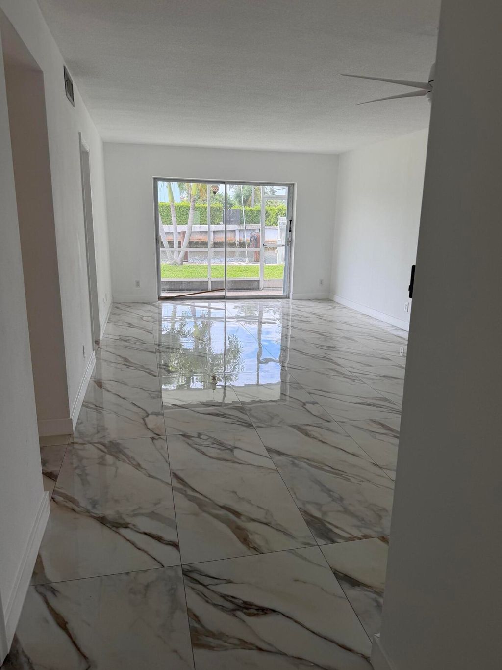 Photo of 1100 Pine Drive #102, Pompano Beach, FL 33060 (MLS # B26016028)