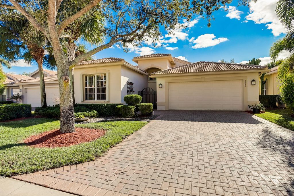 Photo of 8290 Sandpiper Glen Drive Dr, Lake Worth Beach, FL 33467 (MLS # R10768711)