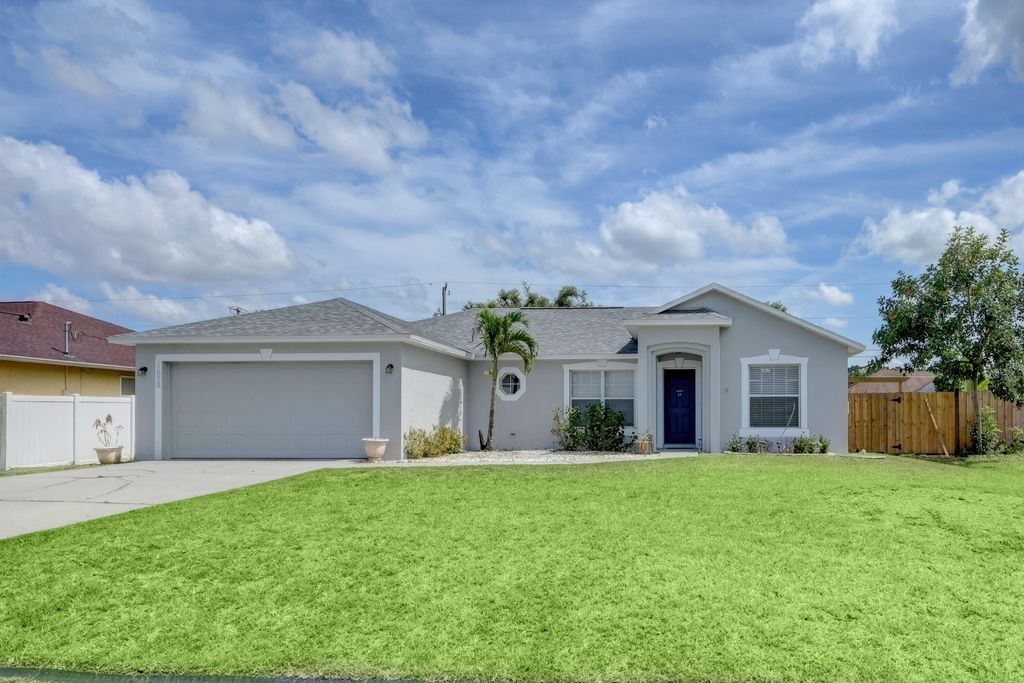 Photo of 1638 SW Meridian Avenue, Port Saint Lucie, FL 34953 (MLS # R10803694)