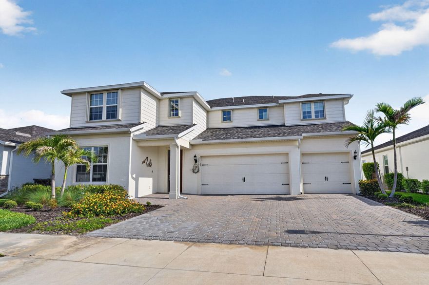 Welcome to this beautifully designed Roseland model by Pulte, located in the sought-after Northridge at Babcock Ranch. This home was thoughtfully created for multi-generational living, offering a private in-law suite on the main floor along with expansive living spaces for gathering and everyday comfort. One of the true highlights of this home—and a favorite of the current owners—is the stunning kitchen, featuring an impressive oversized island and gas range, making it the perfect space for cooking, entertaining, and bringing everyone together. Upstairs, a finished loft provides additional flexible living space—ideal for a second family room, media area, or private retreat. There are 4 bedrooms upstairs, two separated by a jack n jill bathroom, a primary suite with a private work out area