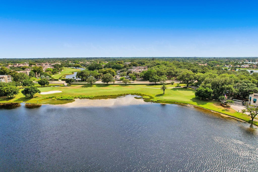 Photo of 9460 Poinciana Place #203, Davie, FL 33324 (MLS # B26079789)