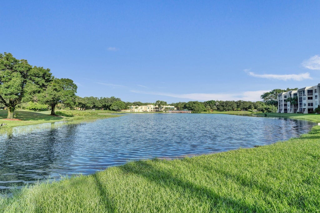 Photo of 9460 Poinciana Place #203, Davie, FL 33324 (MLS # B26079789)