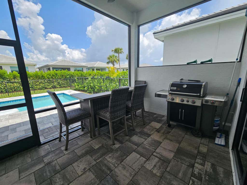 Photo of 9142 SW Esule Way, Port Saint Lucie, FL 34987 (MLS # B26038794)