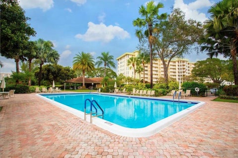 Tiny photo for 2600 S Course Drive #106, Pompano Beach, FL 33069 (MLS # B26038141)