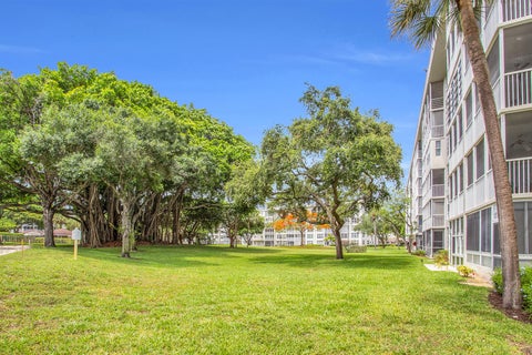 Tiny photo for 2600 S Course Drive #106, Pompano Beach, FL 33069 (MLS # B26038141)