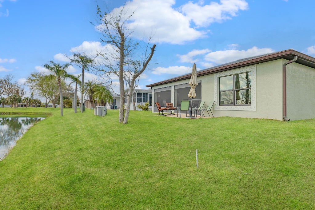 Photo of 14349 Dulce Real Real, Fort Pierce, FL 34951 (MLS # R11062030)