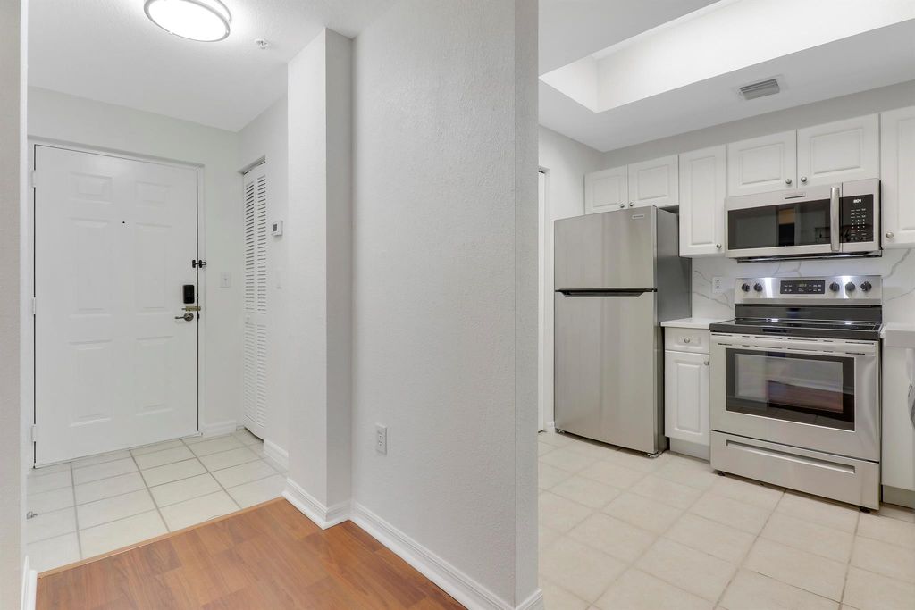 Photo of 2809 Amalei Drive #202, Palm Beach Gardens, FL 33410 (MLS # R11090146)