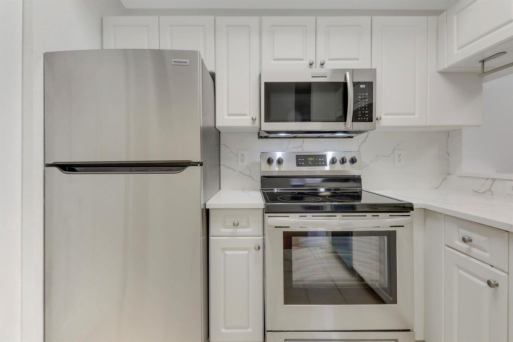 Photo of 2809 Amalei Drive #202, Palm Beach Gardens, FL 33410 (MLS # R11090146)