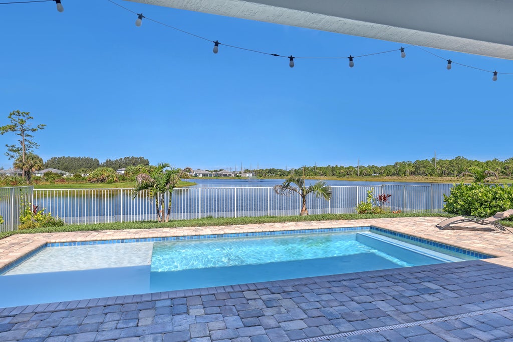 Photo of 9774 SW Meridian Way, Stuart, FL 34997 (MLS # B26047591)