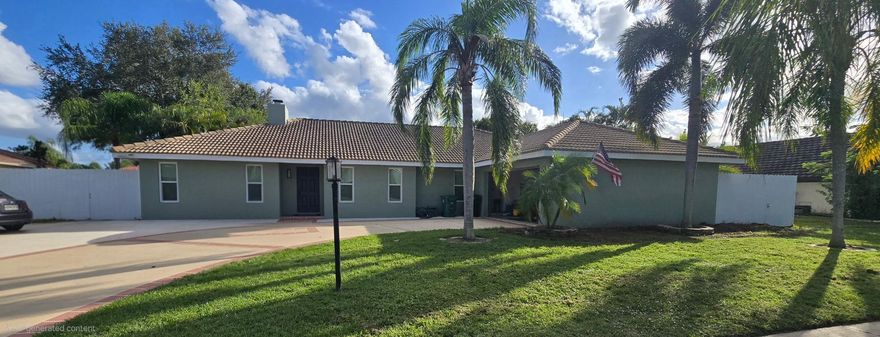 Welcome to this beautifully updated home situated on an oversized interior lot of more than 16,000 sq. ft. Offering both comfort and convenience, this residence blends modern upgrades with an exceptional location just minutes from US-1 shopping, St. Lucie Medical Center, and a short drive to the vibrant dining, parks, and sandy shores of Jensen Beach. Designed for peace of mind and everyday ease, the home features a combination of hurricane impact windows and accordion shutters for added storm protection. An extended oversized driveway provides ample room for parking, perfect for guests, boats, or rec vehicles. A newer A/C and water heater ensure year-round efficiency and comfort, while a durable Duramax 7-ft metal privacy fence encloses the property creating a very private setting.