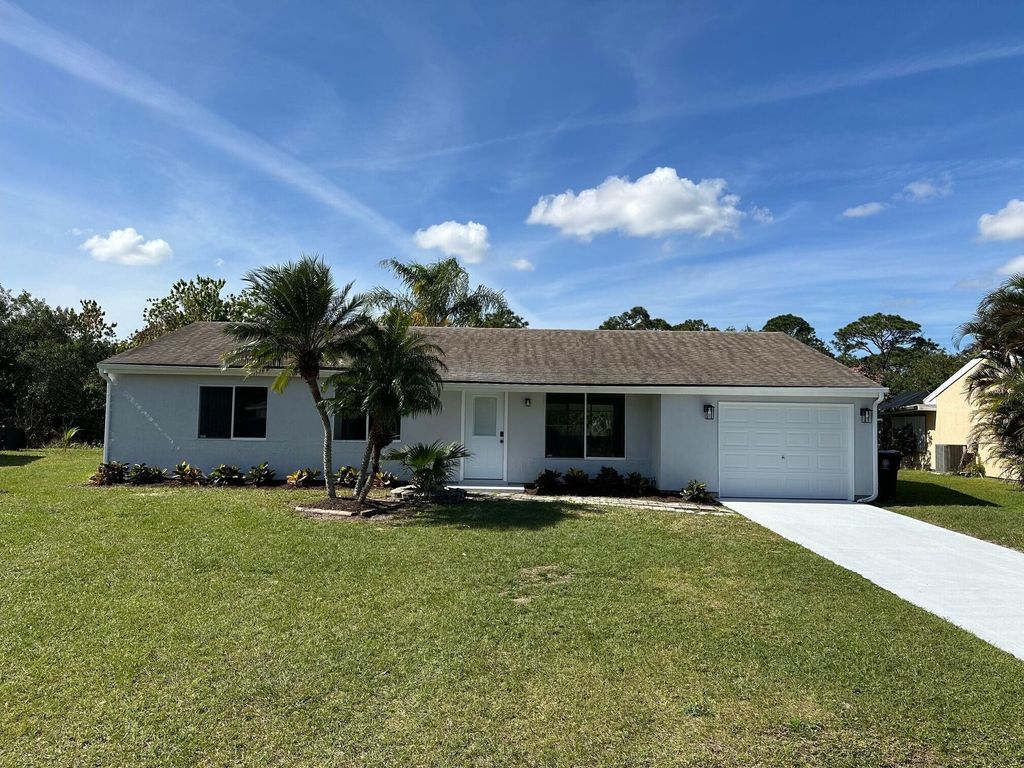 Photo of 1714 SE Elkhart Terrace, Port Saint Lucie, FL 34953 (MLS # R10953187)