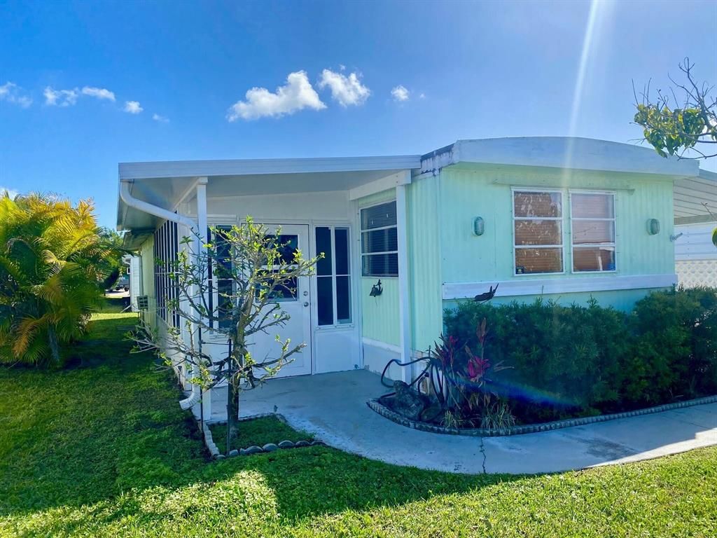 Photo of 626 Tahiti Way, Jensen Beach, FL 34957 (MLS # R10778964)