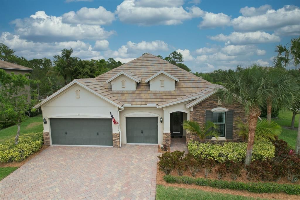 Photo of 1171 SW Cherry Blossom Lane, Palm City, FL 34990 (MLS # R10880443)