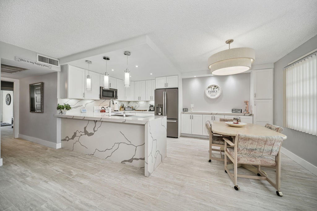 Photo of 364 WELLINGTON J, West Palm Beach, FL 33417 (MLS # B26078699)