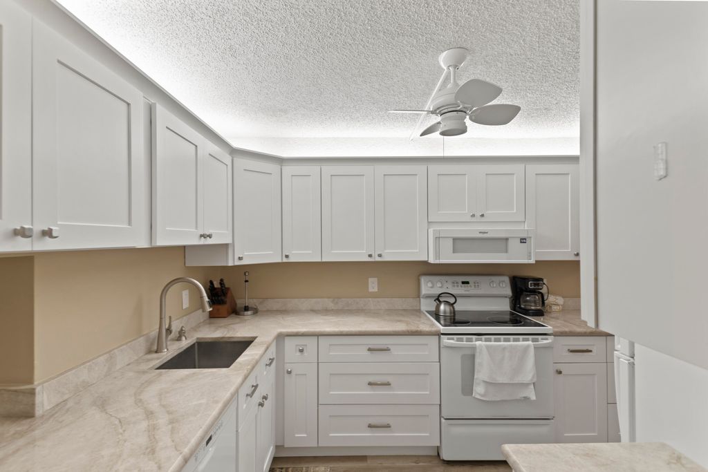 Photo of 10155 Mangrove Drive #105, Boynton Beach, FL 33437 (MLS # R11159036)