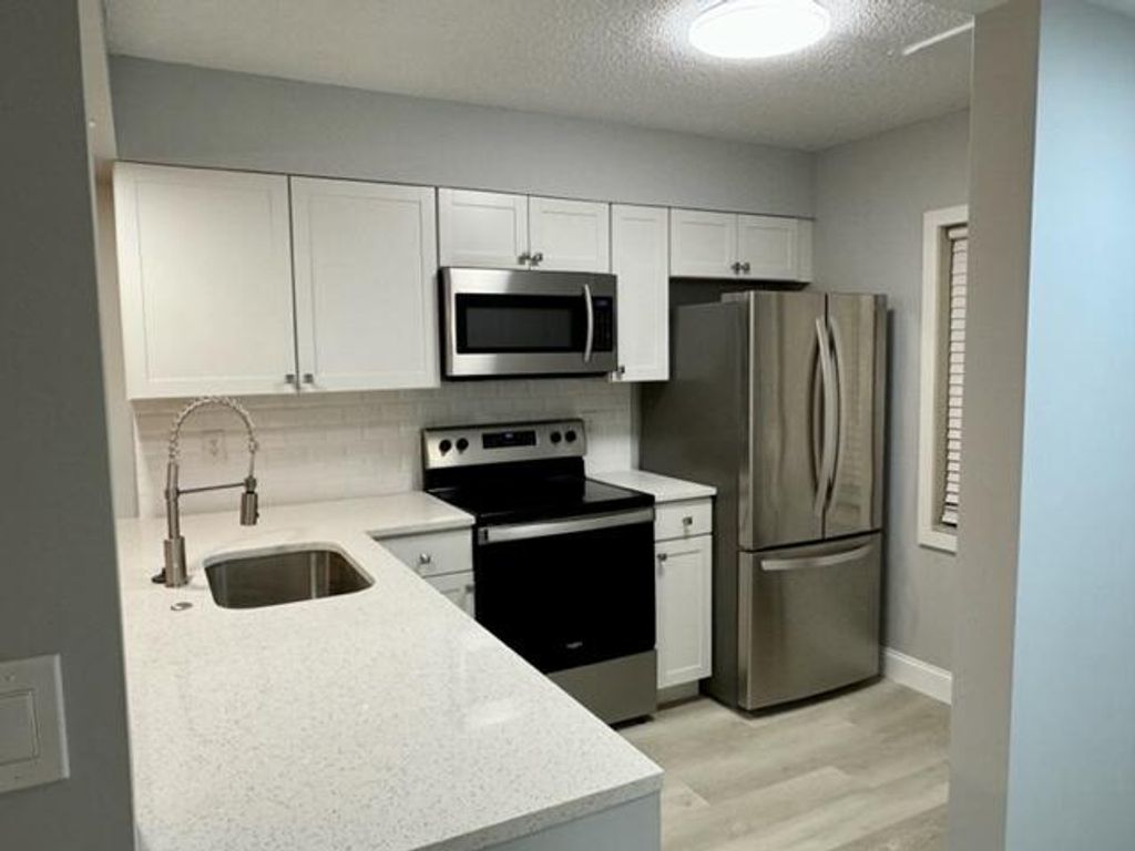 Photo of 3051 SE Aster Lane #403, Stuart, FL 34994 (MLS # R10955119)