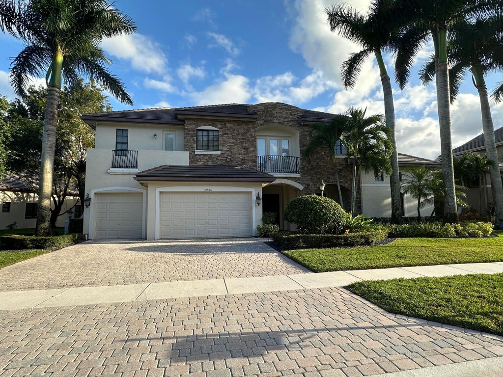 Photo of 10526 Versailles Boulevard, Wellington, FL 33449 (MLS # B26002971)