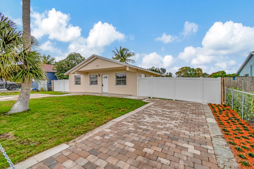 Photo of 1016 W Lakewood Road, West Palm Beach, FL 33405 (MLS # R11158748)