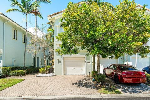 Photo of 3263 Laurel Ridge Circle, Riviera Beach, FL 33404 (MLS # R11121326)