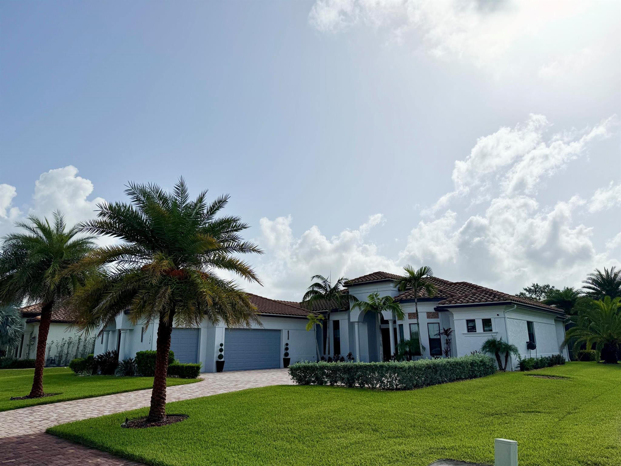 Enjoy the convenience and peace of mind that comes with this private pool home located in a double-gated community. Built in 2017, this custom-designed home is a true haven of comfort. The home features a private wing dedicated to the Primary Suite and office, which includes an oversized bedroom with a tray ceiling and a sitting area that overlooks the pool. The double walk-in closet is equipped with custom shelves & drawers. The Primary bathroom is bright & airy, with double vanities & a zero-edge glass shower with pebble flooring.The open plan is ideal for hosting gatherings, with spacious dining, kitchen, and family rooms. Two guest suites are connected by a Jack & Jill bath. Step out onto the tranquil screened lanai to enjoy the free-form pool. Pool & yard maintenance are included.