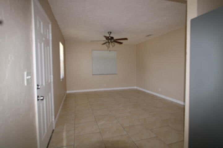 Photo of 1412 W 6TH Street, Riviera Beach, FL 33404 (MLS # B26063181)
