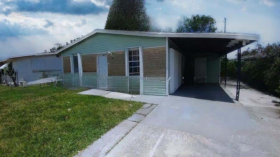 Photo of 1412 W 6TH Street, Riviera Beach, FL 33404 (MLS # B26063181)