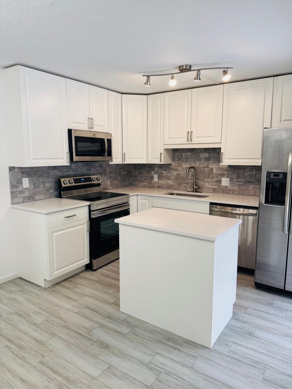 Photo of 1301 13th Terrace, Palm Beach Gardens, FL 33418 (MLS # R11083839)