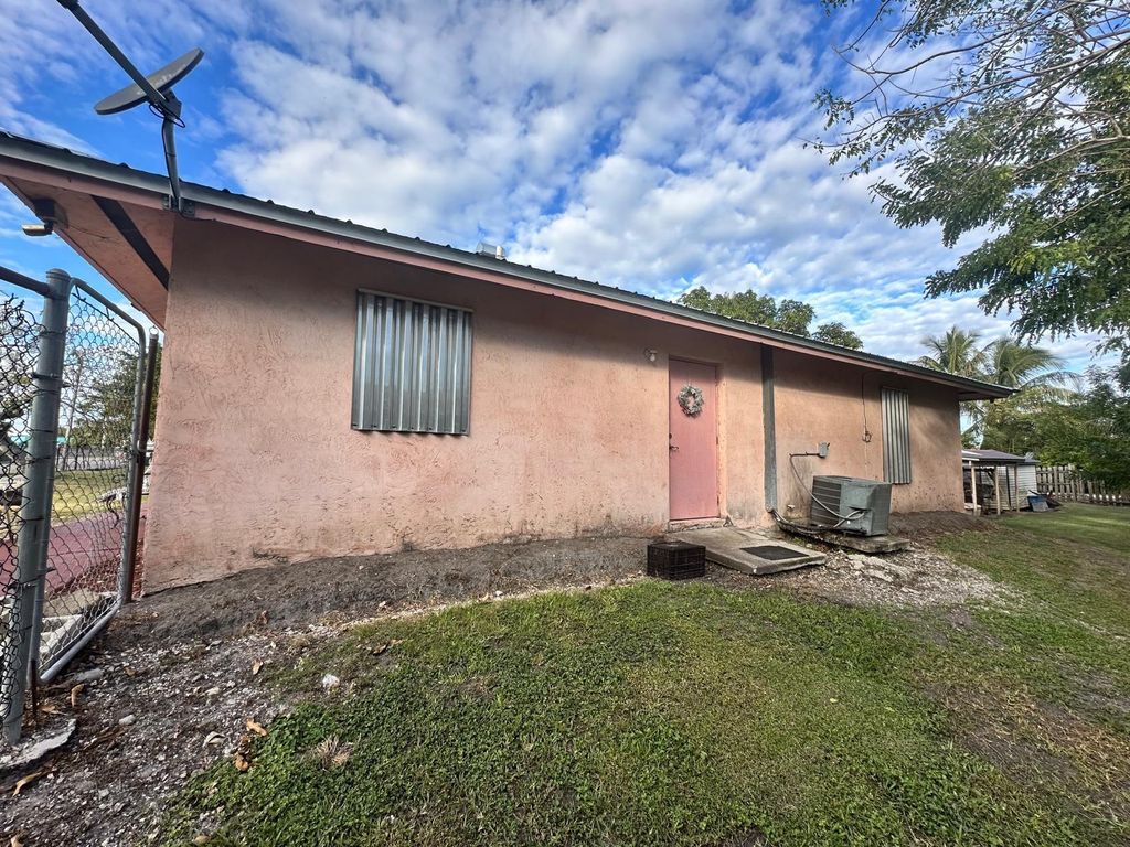 Photo of 140 Banyan Avenue, Pahokee, FL 33476 (MLS # F10475020)