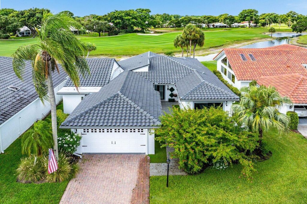 Photo of 51 Woods Lane, Boynton Beach, FL 33436 (MLS # R11055735)