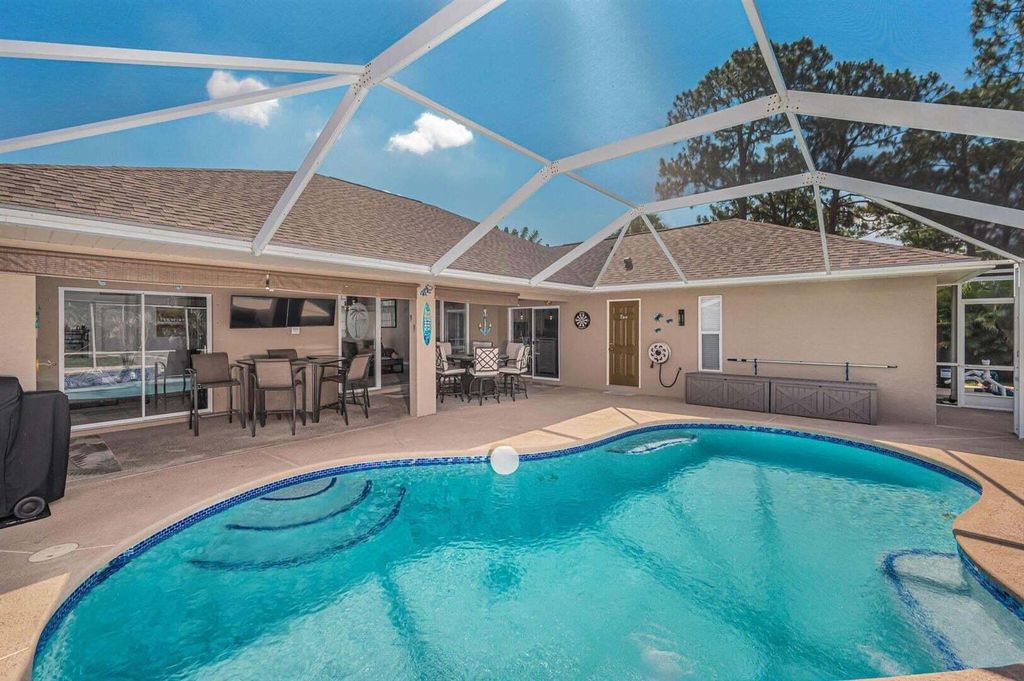 Photo of 140 SW Pilsner Circle, Port Saint Lucie, FL 34953 (MLS # R11056661)