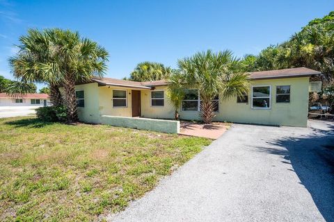 Photo of 371 W 34th Street, Riviera Beach, FL 33404 (MLS # R11102741)
