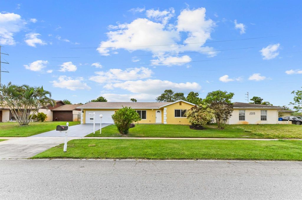 Photo of 2561 Canterbury Drive S, West Palm Beach, FL 33407 (MLS # R11080823)