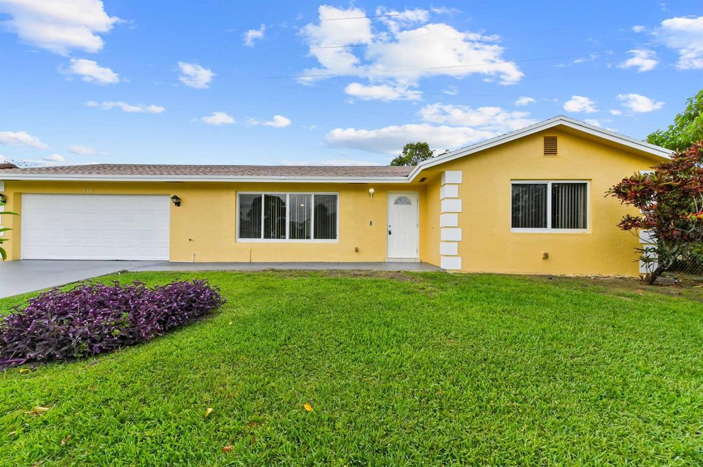 Photo of 2561 Canterbury Drive S, West Palm Beach, FL 33407 (MLS # R11080823)
